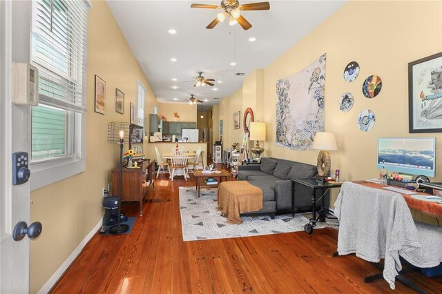 41719 S Genois St, New Orleans, LA 70119 - living room featuring ceiling fan, recessed lighting, baseboards, and wood finished floors
