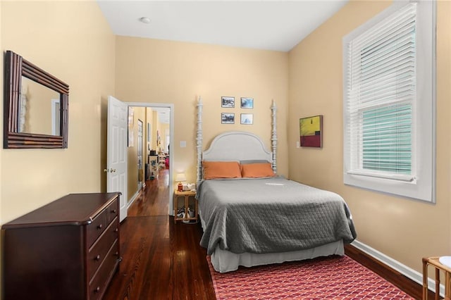 41719 S Genois St, New Orleans, LA 70119 - bedroom with dark wood-type flooring and baseboards