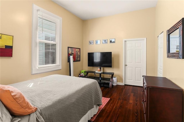 41719 S Genois St, New Orleans, LA 70119 - bedroom with baseboards and dark wood-style floors