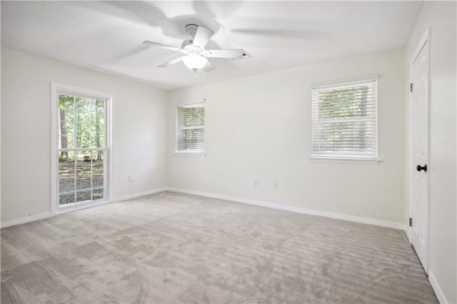68 Begonia Dr, Covington, LA 70433 - empty room featuring carpet floors, a ceiling fan, and baseboards