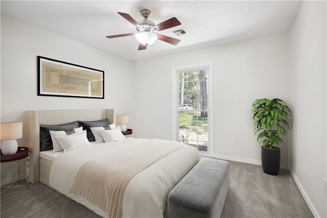 68 Begonia Dr, Covington, LA 70433 - bedroom with baseboards, ceiling fan, carpet flooring, and visible vents