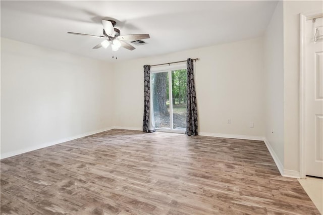 68 Begonia Dr, Covington, LA 70433 - unfurnished room with ceiling fan, baseboards, light wood-type flooring, and visible vents