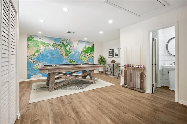 68 Begonia Dr, Covington, LA 70433 - interior space featuring wood finished floors, attic access, visible vents, recessed lighting, and baseboards