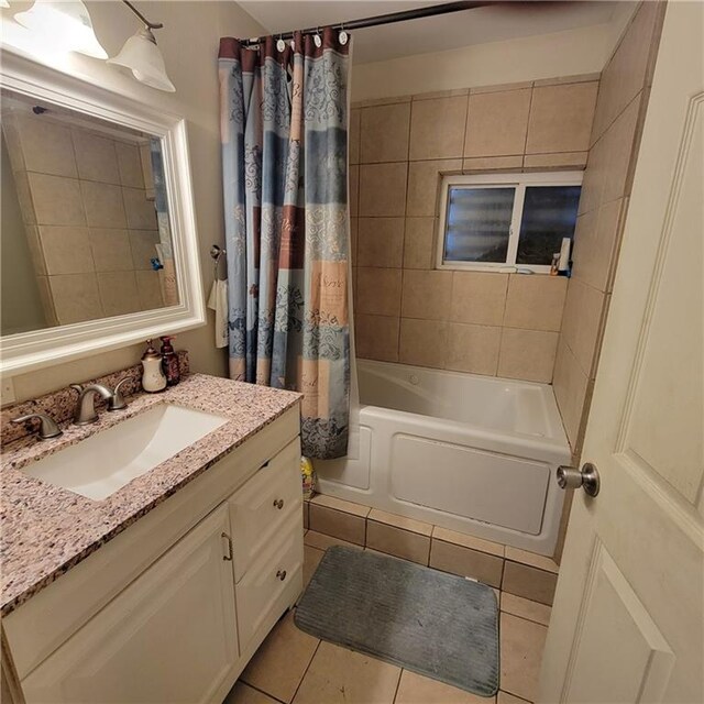 3024 Kansas St, New Orleans, LA 70114 - full bath with vanity, tile patterned flooring, and shower / bath combination with curtain