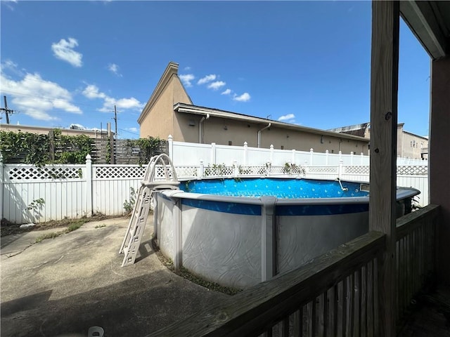 3024 Kansas St, New Orleans, LA 70114 - view of swimming pool with a fenced in pool and a fenced backyard