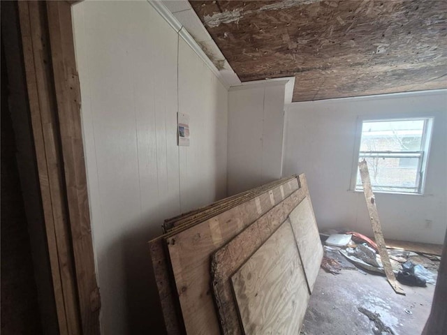 319 Pearl St, Jennings, LA 70546 - living room featuring wood walls and a ceiling fan