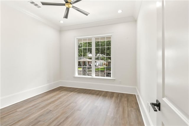 2904 Green Acres Rd, Metairie, LA 70003 - spare room featuring baseboards, wood finished floors, a ceiling fan, crown molding, and recessed lighting