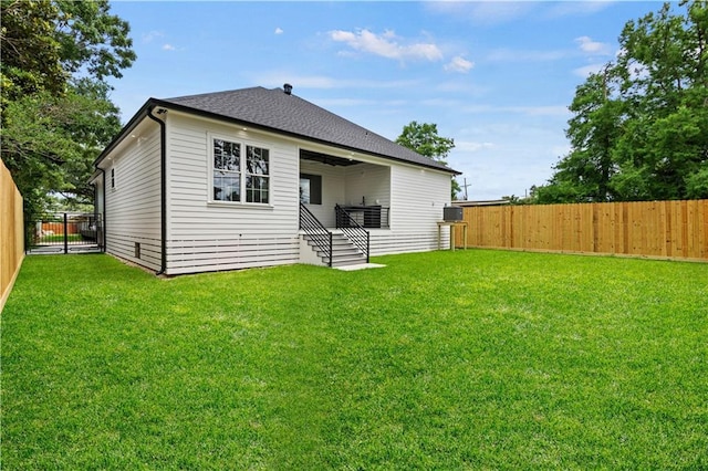 2904 Green Acres Rd, Metairie, LA 70003 - back of house featuring a shingled roof and stairway