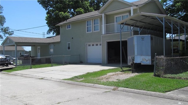 362 W Ave, Harahan, LA 70123 - view of front of property with concrete driveway, a garage, and fence