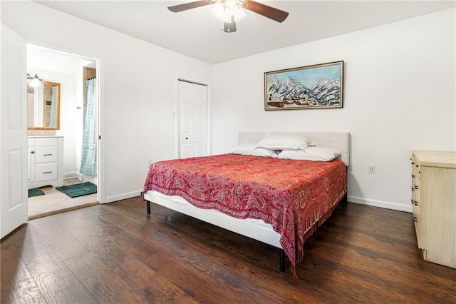 bedroom featuring a ceiling fan, a closet, hardwood / wood-style floors, ensuite bathroom, and baseboards