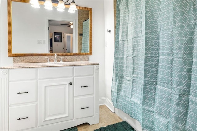 full bathroom with tile patterned flooring, a shower with curtain, and vanity