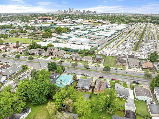 birds eye view of property featuring a city view
