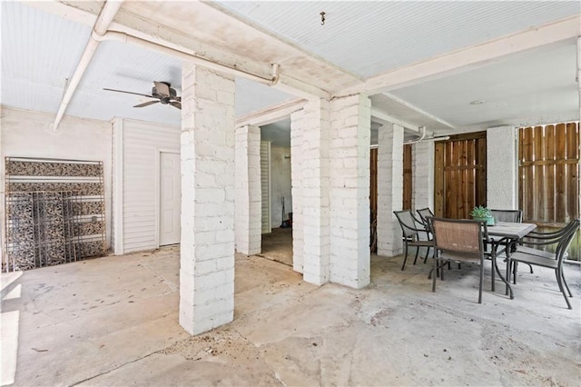 view of patio featuring a ceiling fan and outdoor dining area