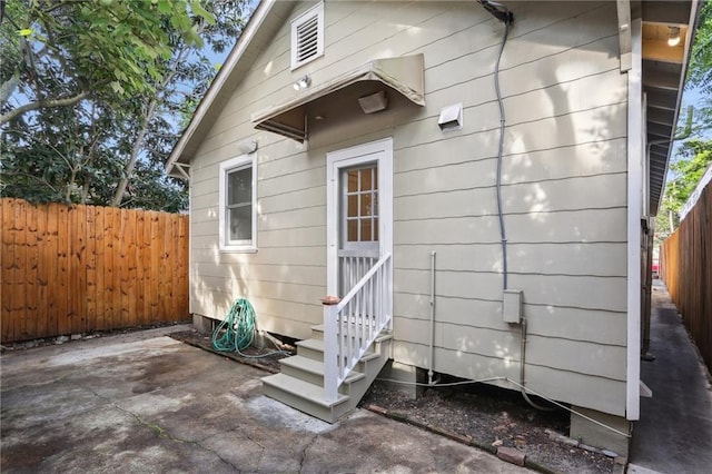 exterior space with a patio area and fence