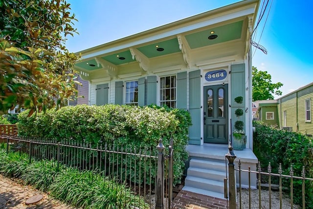 doorway to property with fence