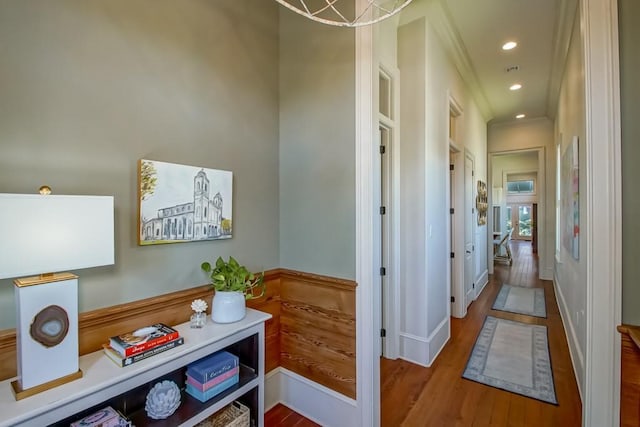 hallway with wood finished floors and recessed lighting