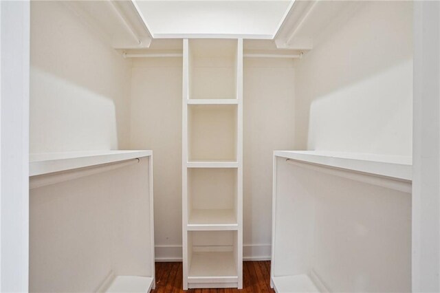 925 Picheloup Pl, New Orleans, LA 70119 - walk in closet with wood finished floors