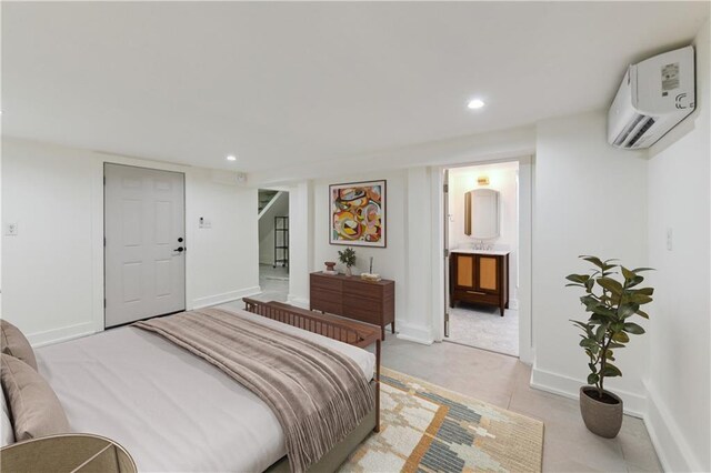 925 Picheloup Pl, New Orleans, LA 70119 - bedroom with a wall mounted AC, recessed lighting, and ensuite bathroom
