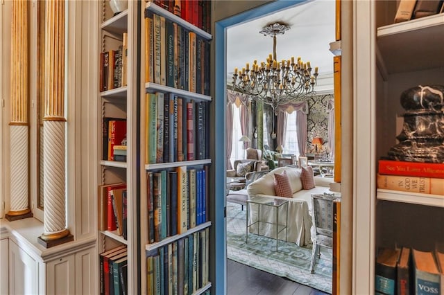 600 Governor Nicholls St, New Orleans, LA 70116 - miscellaneous room with a chandelier and wood finished floors