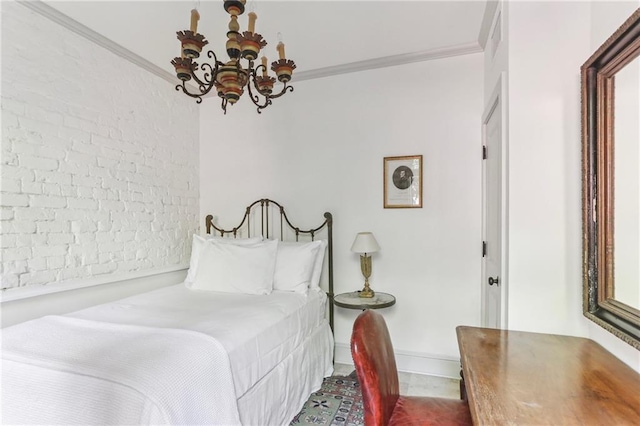 600 Governor Nicholls St, New Orleans, LA 70116 - bedroom with a chandelier, ornamental molding, brick wall, and baseboards