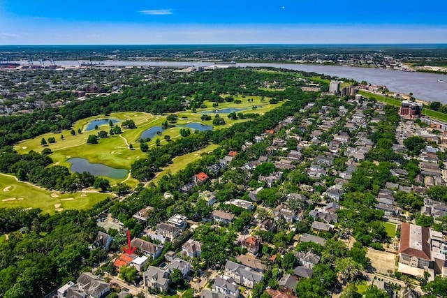 aerial view featuring view of golf course, a water view, and a residential view