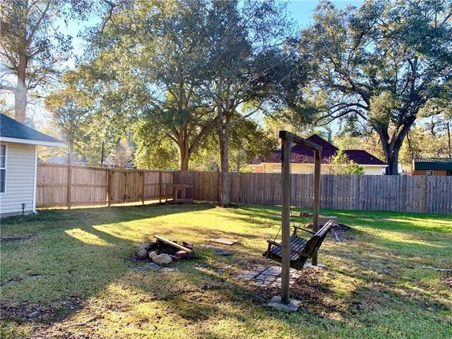 27155 Tag A Long Rd, Lacombe, LA 70445 - view of yard featuring a fenced backyard