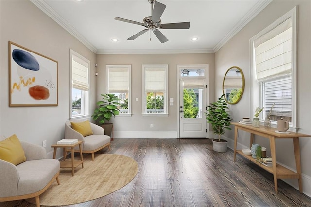 2520 Conti St, New Orleans, LA 70119 - living area with plenty of natural light, dark wood-style floors, baseboards, ornamental molding, and ceiling fan
