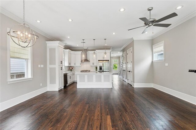 2520 Conti St, New Orleans, LA 70119 - unfurnished living room featuring recessed lighting, a chandelier, baseboards, dark wood-style flooring, and a ceiling fan