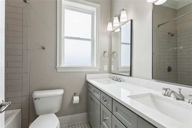2520 Conti St, New Orleans, LA 70119 - bathroom featuring toilet, double vanity, and baseboards