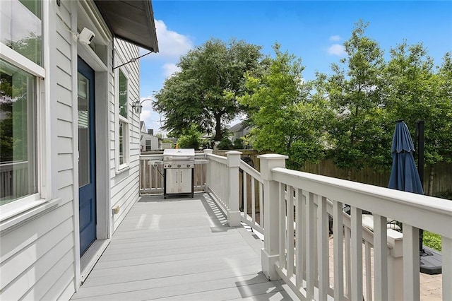 2520 Conti St, New Orleans, LA 70119 - view of wooden balcony featuring a wooden deck and grilling area
