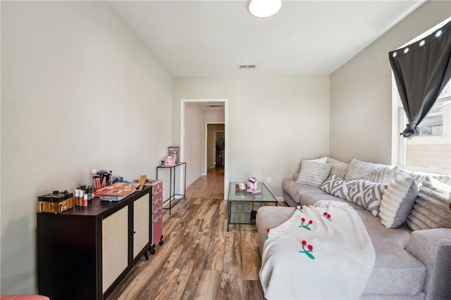 3619-25 Delachaise St, New Orleans, LA 70125 - living room featuring visible vents and wood finished floors