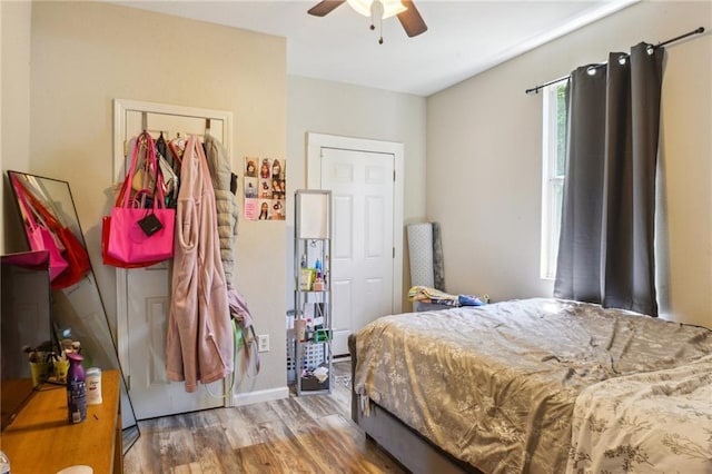 3619-25 Delachaise St, New Orleans, LA 70125 - bedroom with a ceiling fan, wood finished floors, and baseboards