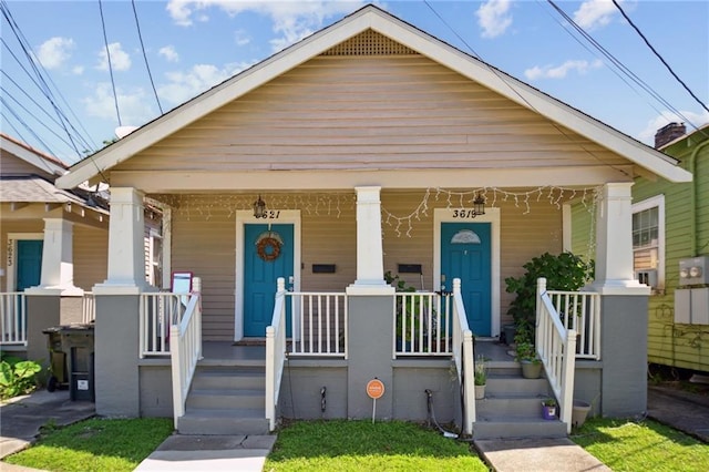 3619-25 Delachaise St, New Orleans, LA 70125 - view of front facade featuring a porch
