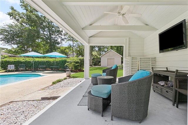 72 Riverdale Dr, Covington, LA 70433 - view of patio featuring an outbuilding, a ceiling fan, an outdoor pool, and outdoor dining area