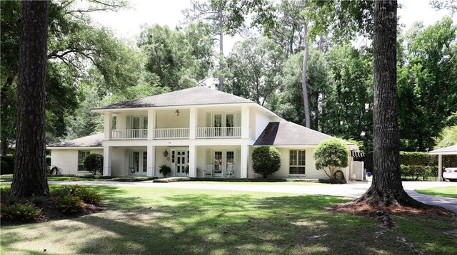72 Riverdale Dr, Covington, LA 70433 - surrounding community with a lawn
