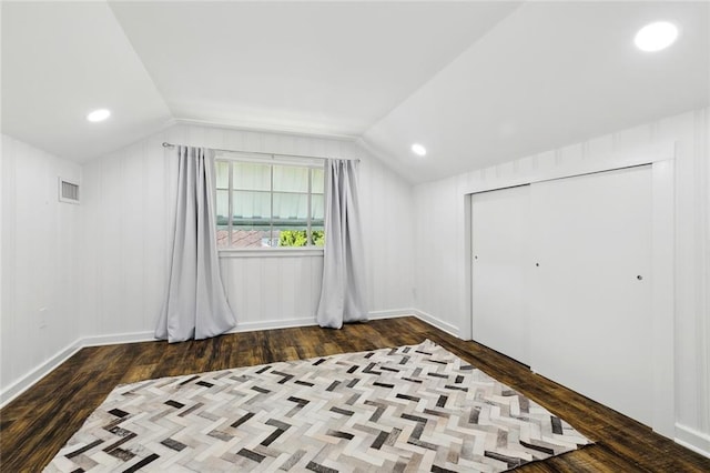 704 Sumner St, New Orleans, LA 70114 - unfurnished bedroom with hardwood / wood-style floors, lofted ceiling, and a closet