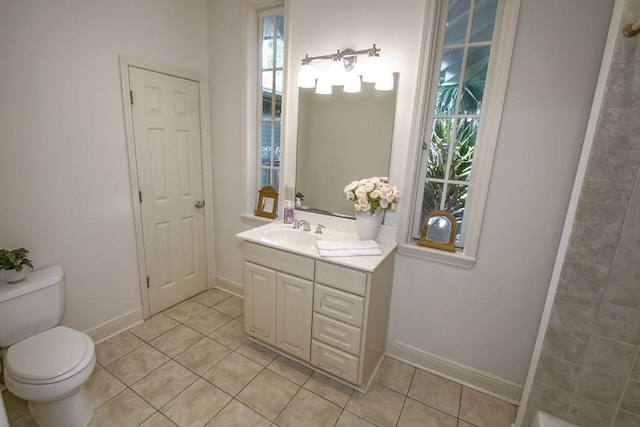 full bath featuring tile patterned flooring, toilet, baseboards, and vanity