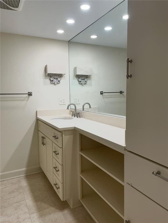 bathroom featuring recessed lighting, baseboards, visible vents, tile patterned flooring, and vanity