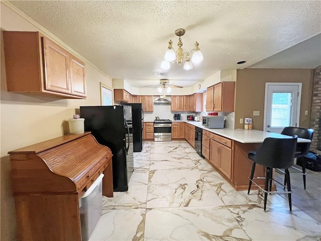 kitchen with a textured ceiling, marble finish floor, brown cabinets, black appliances, and light countertops