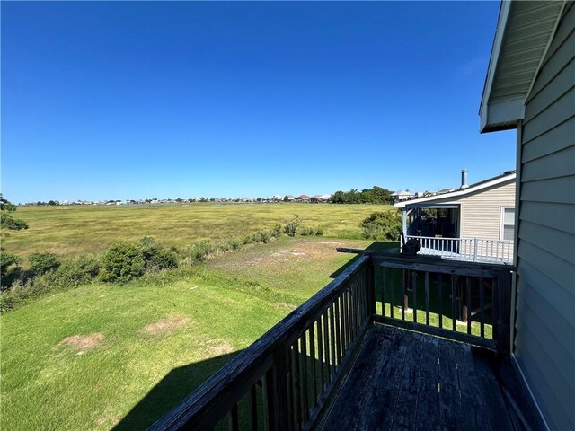 119 Carr Dr, Slidell, LA 70458 - wooden terrace featuring a yard and a rural view
