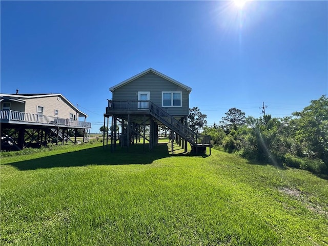 119 Carr Dr, Slidell, LA 70458 - rear view of property with stairway, a deck, and a yard
