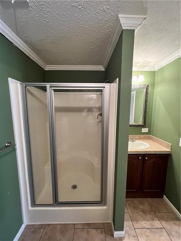 119 Carr Dr, Slidell, LA 70458 - bathroom with a stall shower, tile patterned floors, vanity, and crown molding