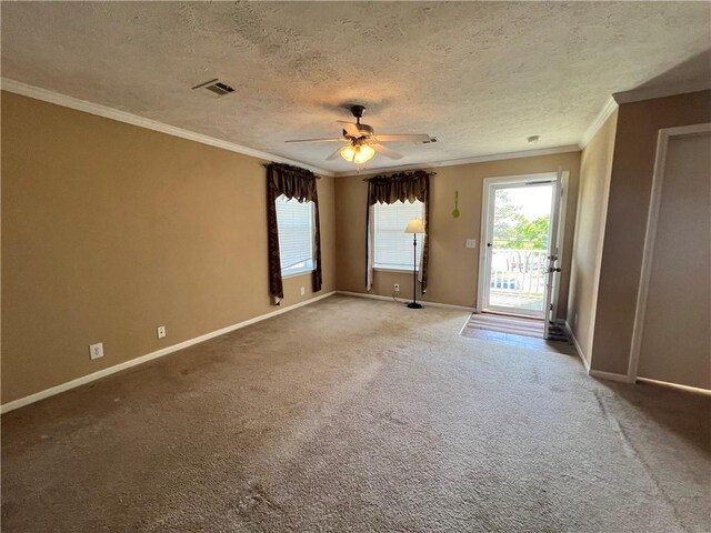 119 Carr Dr, Slidell, LA 70458 - empty room with a ceiling fan, baseboards, carpet flooring, ornamental molding, and visible vents