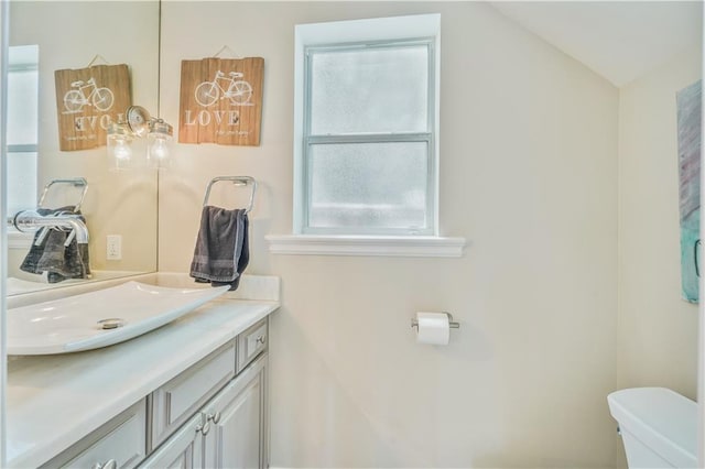 7468 Pitt St, New Orleans, LA 70118 - bathroom featuring toilet and vanity