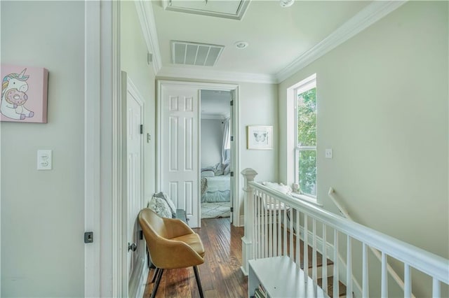 7468 Pitt St, New Orleans, LA 70118 - hallway with an upstairs landing, ornamental molding, dark wood-style floors, and visible vents