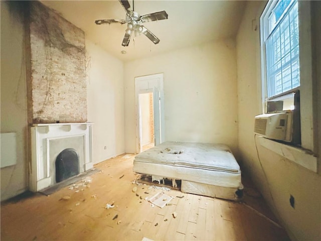 30103 Tricou St, New Orleans, LA 70117 - bedroom featuring cooling unit, ceiling fan, and hardwood / wood-style floors