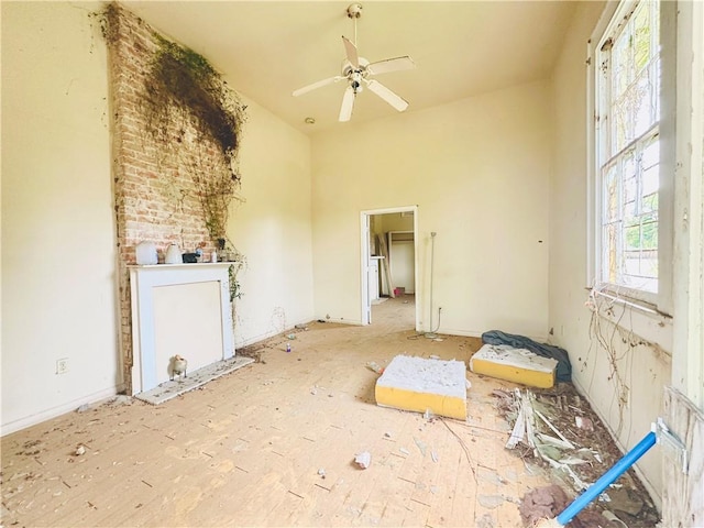 30103 Tricou St, New Orleans, LA 70117 - unfurnished room with a ceiling fan and a towering ceiling