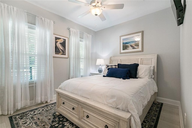 965 Kino St, Diamondhead, MS 39525 - doorway to outside with baseboards, light wood-style floors, and arched walkways