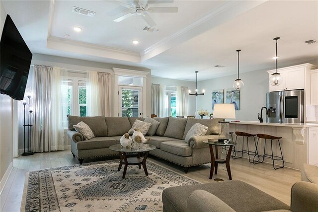 965 Kino St, Diamondhead, MS 39525 - sitting room with light wood-type flooring, a ceiling fan, and baseboards