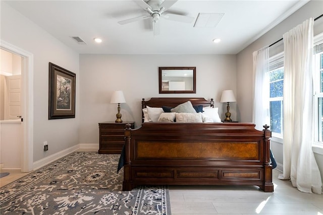 965 Kino St, Diamondhead, MS 39525 - kitchen with appliances with stainless steel finishes, recessed lighting, white cabinets, light wood-style floors, and light countertops